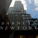 A building is reflected in the Barneys New York store window June 22, 2007, in New York City.
Mario Tama/Getty Images